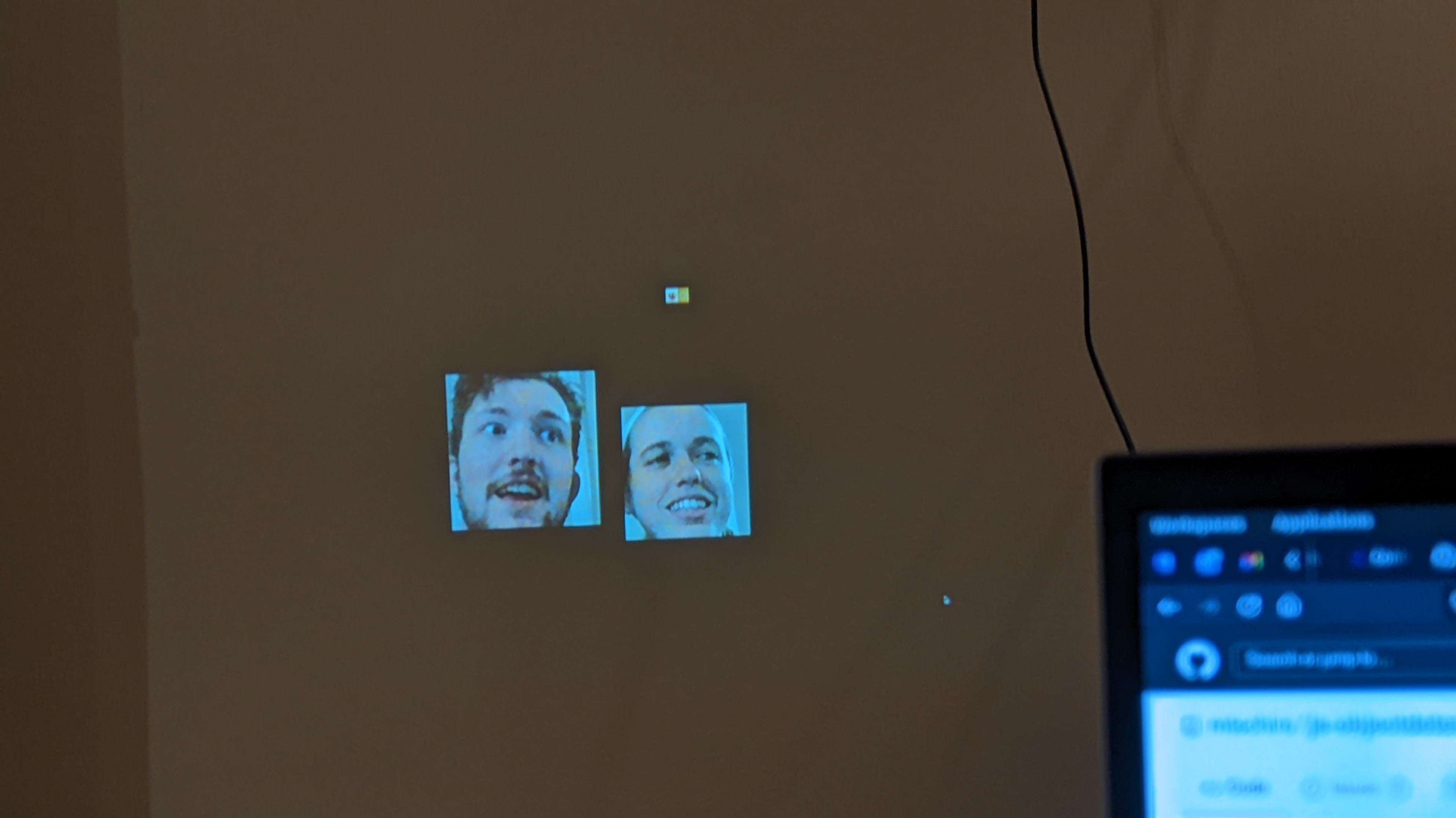 Ian & Emma's faces projected on the wall
